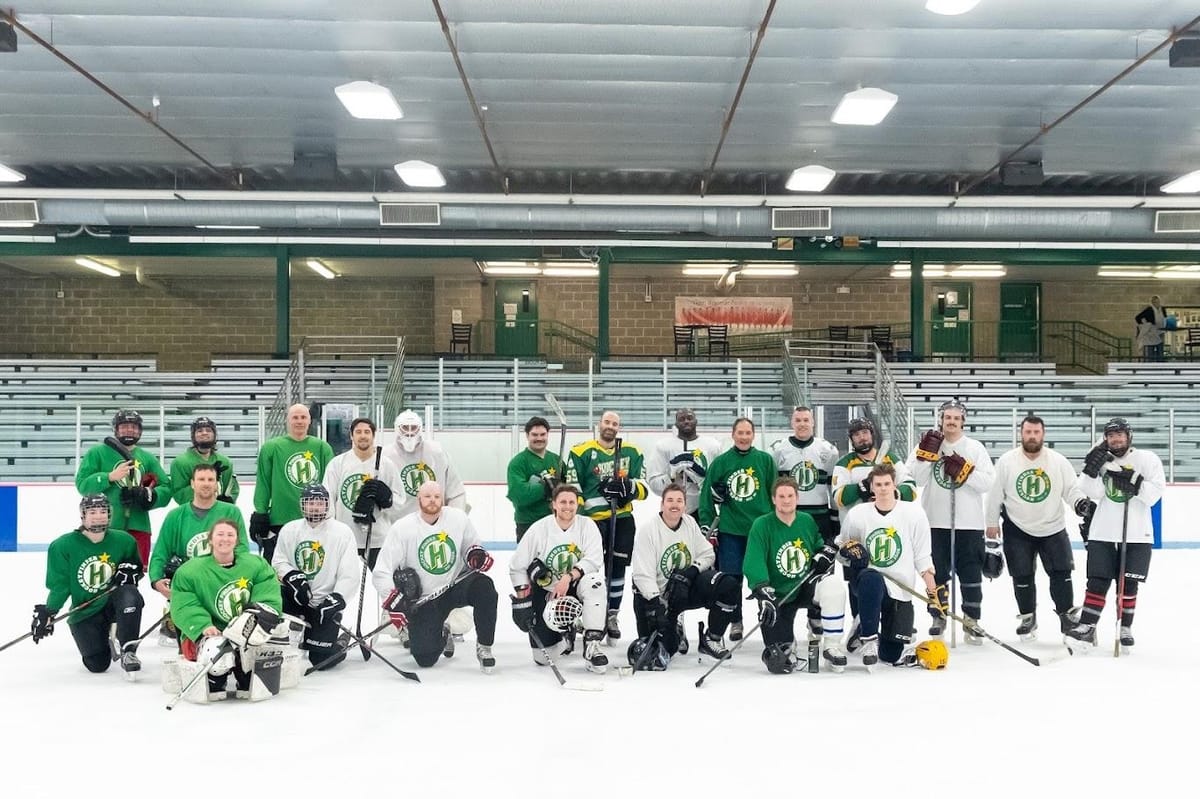 Beer league hockey teammates together on the ice